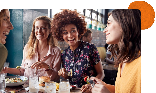 Group of friends sharing a meal at a restaurant