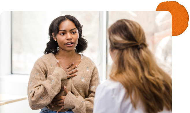 Patient speaking with a health care provider about esophageal health